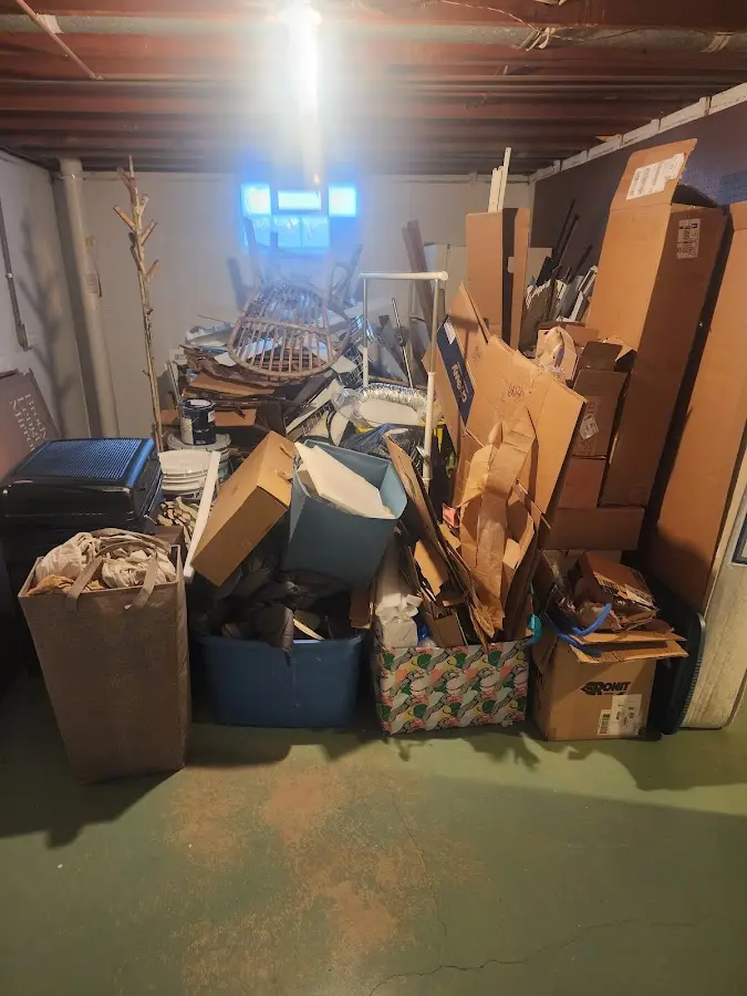 Roll-off dumpster container at job site for Yard Waste Dumpster Rental in Gonzales